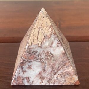 Carved stone pyramid